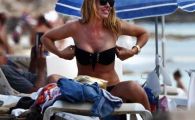 
	Cat de SEXY este sotia lui Francesco Totti! Vezi super poze cu Ilary Blasi doar in costum de baie!
