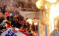 
	VIDEO / Scene INCREDIBILE la Grecia - Croatia! O BOMBA a explodat pe stadion, o peluza a fost incendiata, arbitrul a oprit meciul!
