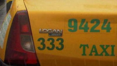 
	Soferii si-au facut cruce cand l-au vazut! Un taximetrist si-a lipit asta pe masina si a facut turul Bucurestiului!
