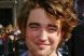 Robert Pattinson si-a vandut saruturile pentru bani