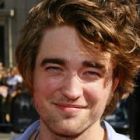 Robert Pattinson si-a vandut saruturile pentru bani