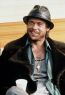 Filmul lui Guy Ritchie Snatch.(2000) l-a adus pe Brad Pitt in ipostaza unui tigan boxeur implicat in luptele ilegale ale mafiotilor englezi.