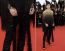 Li Yuchun aka Chris Lee: Cele doua nu au aratat nimic prin costumul negru, stralucitor si neinspirat pentru o premiera la Cannes.