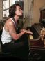 42. La pian: Depp, care a cantat la chitara in mai multe cluburi mici, apare intr-un poster in care sta asezat la pian, fumand o tigara, o imagine care ii descrie perfect personalitatea complexa de artist.