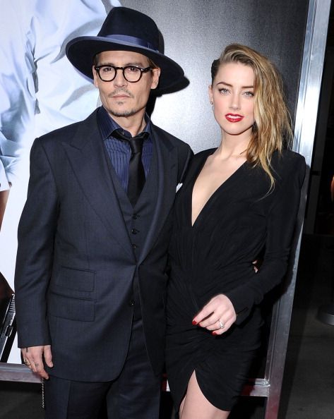 Johnny Depp: actorul a venit sa isi sustina iubita, Amber Heard, la premiera noului ei film, 3 Days To Kill: cum au aparut cei doi pe covorul rosu