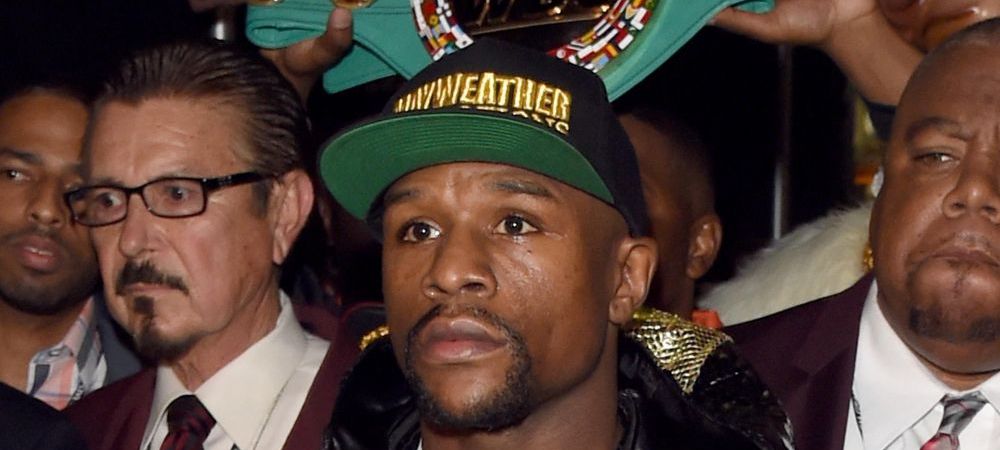 Cat a incasat un fost jucator al lui Arsenal <span style="color:#f00;">dupa ce a pariat 50.000 de lire pe victoria lui Mayweather </span>cu Pacquiao