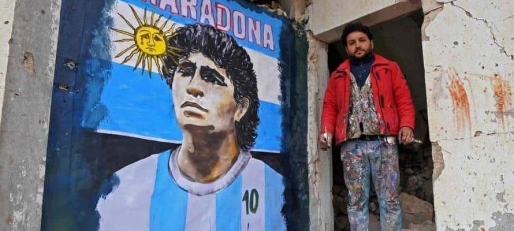 <span style="color:#f00;">Emotionant! Omagiu pentru Maradona din mijlocul infernului! </span>Un pictor sirian a realizat un portret al argentinianului pe o cladire devastata in urma razboiului