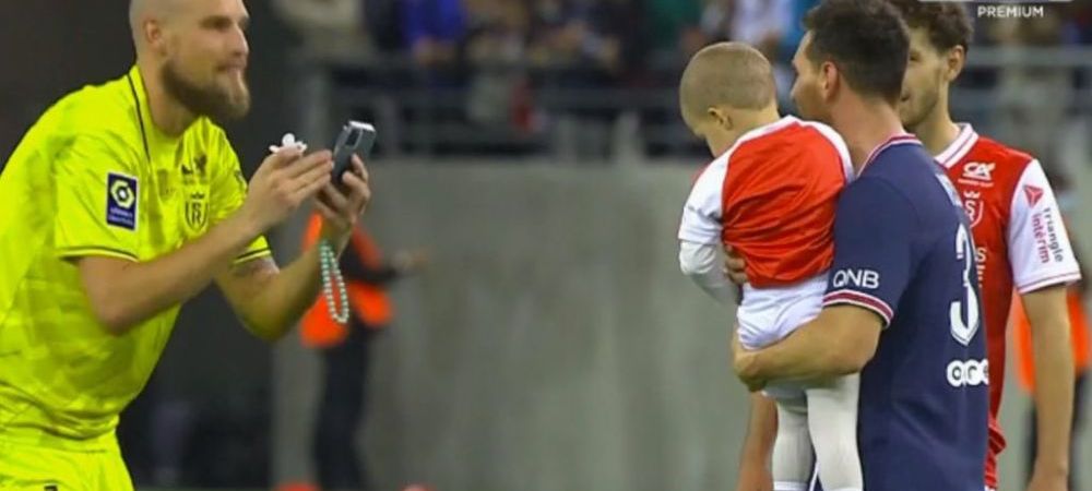 <span style="color:#f00;">VIDEO </span>Sunt imaginile momentului! Portarul lui Reims și-a dus copilul la finalul meciului pentru a-l poza cu Messi
